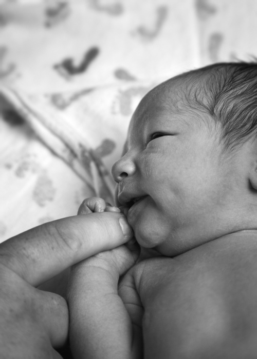 Newborn baby in the hospital moments after birth