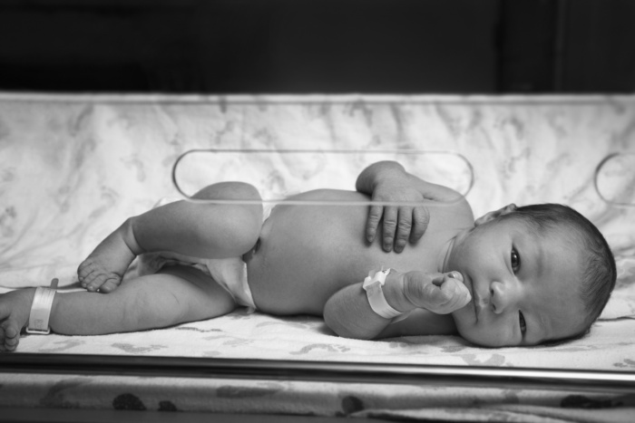 Newborn baby in the hospital moments after birth