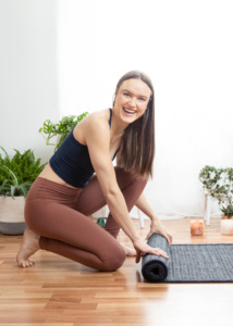 Young Woman Practicing Yoga at Home