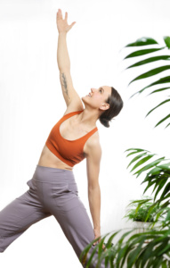 Young Woman Practicing Yoga at Home