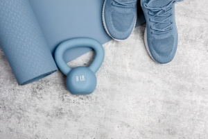 Blue Fitness Gear Styled on a Concrete Floor