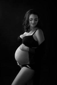Black and White Portrait of a Beautiful Pregnant Woman in Lingerie